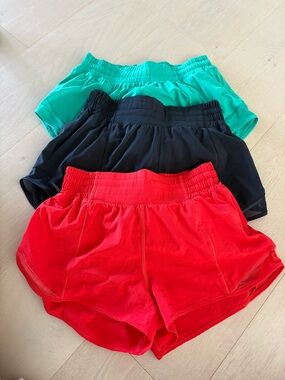 Women’s lot of Lululemon Hottie Hot shorts size 4 black green red
